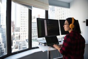Developer learning Python programming on a computer for tech career growth